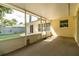 Screened-in porch, seamlessly blending the comfort of indoor living with the tranquility of the outdoors at 4623 Secret River Trl, Port Orange, FL 32129