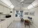Bright kitchen with a dining area and a window with great outdoor views at 51 Fore Dr, New Smyrna Beach, FL 32168