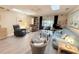Comfortable living room with bright lighting, skylights, and comfortable seating at 51 Fore Dr, New Smyrna Beach, FL 32168