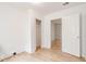 Bright bedroom featuring wood-look floors and an open closet at 514 Mary Ave, New Smyrna Beach, FL 32168