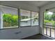 The screened porch provides an excellent view of the back yard at 514 Mary Ave, New Smyrna Beach, FL 32168