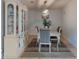 Elegant dining room boasts a china cabinet and stylish decor at 5476 W Bayshore Dr, Port Orange, FL 32127
