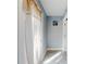 Hallway with natural light from window and light paint at 5476 W Bayshore Dr, Port Orange, FL 32127