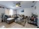 Inviting living room with ample seating, modern decor, and plenty of natural light at 5476 W Bayshore Dr, Port Orange, FL 32127