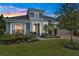 Charming home with well-manicured lawn, beautiful landscaping and a two-car garage at 6294 W Fallsgrove Ln, Port Orange, FL 32128