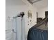 Well-lit garage with water filtration system and vehicle cover at 6294 W Fallsgrove Ln, Port Orange, FL 32128