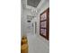 Spacious hallway with unique light fixture and artwork at 6294 W Fallsgrove Ln, Port Orange, FL 32128