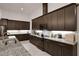 The gourmet kitchen with granite counters and stainless steel appliances at 6294 W Fallsgrove Ln, Port Orange, FL 32128