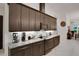 Modern kitchen featuring granite countertops, stainless steel appliances, and ample cabinetry at 6294 W Fallsgrove Ln, Port Orange, FL 32128