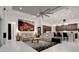 Bright open-concept space featuring living and kitchen areas, with marble floors and modern decor at 6294 W Fallsgrove Ln, Port Orange, FL 32128
