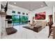 Open living room with a view to the kitchen and the backyard at 6294 W Fallsgrove Ln, Port Orange, FL 32128