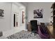 Home office with a neutral palette, office furniture, and an adjacent hallway at 6294 W Fallsgrove Ln, Port Orange, FL 32128