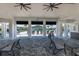 Open-air pool pavilion featuring ample seating and views of the pool area, offering a shaded relaxation space at 6294 W Fallsgrove Ln, Port Orange, FL 32128