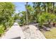 There are multiple pathways around the perimeter of this backyard landscape at 6325 Palmas Bay Cir, Port Orange, FL 32127