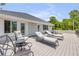 Comfortable outdoor seating area with sun loungers and overhead roofing at 6325 Palmas Bay Cir, Port Orange, FL 32127