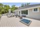 Relaxing deck area with outdoor furniture and beautiful tile roof at 6325 Palmas Bay Cir, Port Orange, FL 32127