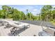 Outdoor deck featuring solar panels and serene landscaping at 6325 Palmas Bay Cir, Port Orange, FL 32127