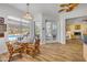 Cozy dining area with views of the screened pool, perfect for casual meals and entertaining at 6325 Palmas Bay Cir, Port Orange, FL 32127