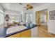 Kitchen and breakfast nook with clear views to the lanai, patio and pool enhancing indoor-outdoor living at 6325 Palmas Bay Cir, Port Orange, FL 32127