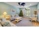 Elegant living room showcasing a tasteful design, comfortable seating, and a festive Christmas tree at 6325 Palmas Bay Cir, Port Orange, FL 32127