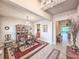 Elegant dining room with chandeliers, hardwood table, and fine décor for sophisticated dining at 6804 Forkmead Ln, Port Orange, FL 32128