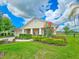 Inviting single-Gathering home with lush landscaping and a screened-in pool for outdoor enjoyment at 6804 Forkmead Ln, Port Orange, FL 32128