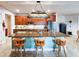 Spacious kitchen island with seating, modern appliances, and ample cabinet space at 6804 Forkmead Ln, Port Orange, FL 32128