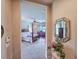 Spacious main bedroom with carpet, ceiling fan, and a four-poster bed at 6804 Forkmead Ln, Port Orange, FL 32128