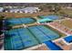Overhead view of well-maintained tennis courts at 6804 Forkmead Ln, Port Orange, FL 32128