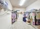 Spacious walk-in closet with wire shelving and ample storage space for clothing and accessories at 6804 Forkmead Ln, Port Orange, FL 32128