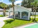Community picnic shelter with tables and chairs at 684 Rochester Ct, New Smyrna Beach, FL 32168