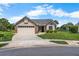 Charming one-story home with a two-car garage and well-maintained landscaping at 684 Rochester Ct, New Smyrna Beach, FL 32168