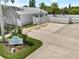 Recreation center with parking area surrounded by landscaping at 684 Rochester Ct, New Smyrna Beach, FL 32168