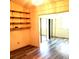 Additional room with built in shelves and doorway leading to another room at 714 Fox Tail Ct, New Smyrna Beach, FL 32168