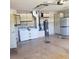 Spacious garage with ample storage cabinets, laundry machines, and water heater at 714 Fox Tail Ct, New Smyrna Beach, FL 32168