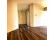 Inviting foyer and living room featuring durable, wood-look flooring at 714 Fox Tail Ct, New Smyrna Beach, FL 32168