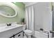 Stylish bathroom boasts updated vanity, subway tile shower, and modern fixtures for a spa-like feel at 800 Black Duck Dr, Port Orange, FL 32127