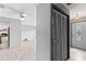 Bright foyer features tile floors, closet, and views into the living space and front door at 800 Black Duck Dr, Port Orange, FL 32127