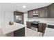A kitchen with stainless steel appliances, kitchen island, and decorative backsplash at 800 Black Duck Dr, Port Orange, FL 32127