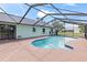 Inviting screened-in pool, with a large deck for entertaining at 800 Black Duck Dr, Port Orange, FL 32127