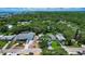 An elevated shot captures a picturesque neighborhood with manicured lawns, lush trees, and inviting homes at 805 E 18Th Ave, New Smyrna Beach, FL 32169
