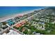 Picturesque aerial shot of a vibrant coastal community with a mix of residential homes near the ocean at 805 E 18Th Ave, New Smyrna Beach, FL 32169