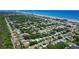 An overview of the beautiful, desirable beach community with luscious tree cover, offering a blend of natural beauty and convenience at 805 E 18Th Ave, New Smyrna Beach, FL 32169
