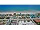 Breathtaking aerial view of oceanfront homes and condos along the pristine beach at 805 E 18Th Ave, New Smyrna Beach, FL 32169