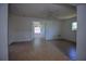 Spacious bedroom featuring tile flooring, natural light, and a ceiling fan at 805 E 18Th Ave, New Smyrna Beach, FL 32169