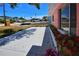 Beautiful flowerbeds accent this home's exterior and landscaping, adding color and curb appeal to the property at 805 E 18Th Ave, New Smyrna Beach, FL 32169
