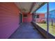 Screened-in porch with concrete flooring and view of backyard at 805 E 18Th Ave, New Smyrna Beach, FL 32169