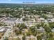 Located near New Smyrna Golf Club, this aerial view showcases a neighborhood surrounded by lush greenery at 807 Craig St, New Smyrna Beach, FL 32168