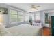 Relaxing bedroom is bathed in sunlight, and offers ample room at 807 Craig St, New Smyrna Beach, FL 32168