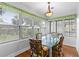 Bright dining area with natural light and seating for four at 807 Craig St, New Smyrna Beach, FL 32168